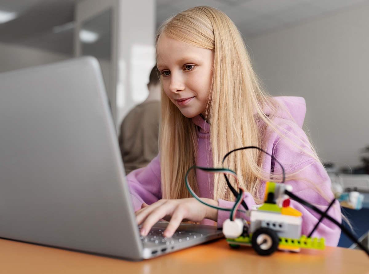 A student using a laptop with an AI-powered study assistant, enhancing learning through smart recommendations and real-time feedback.